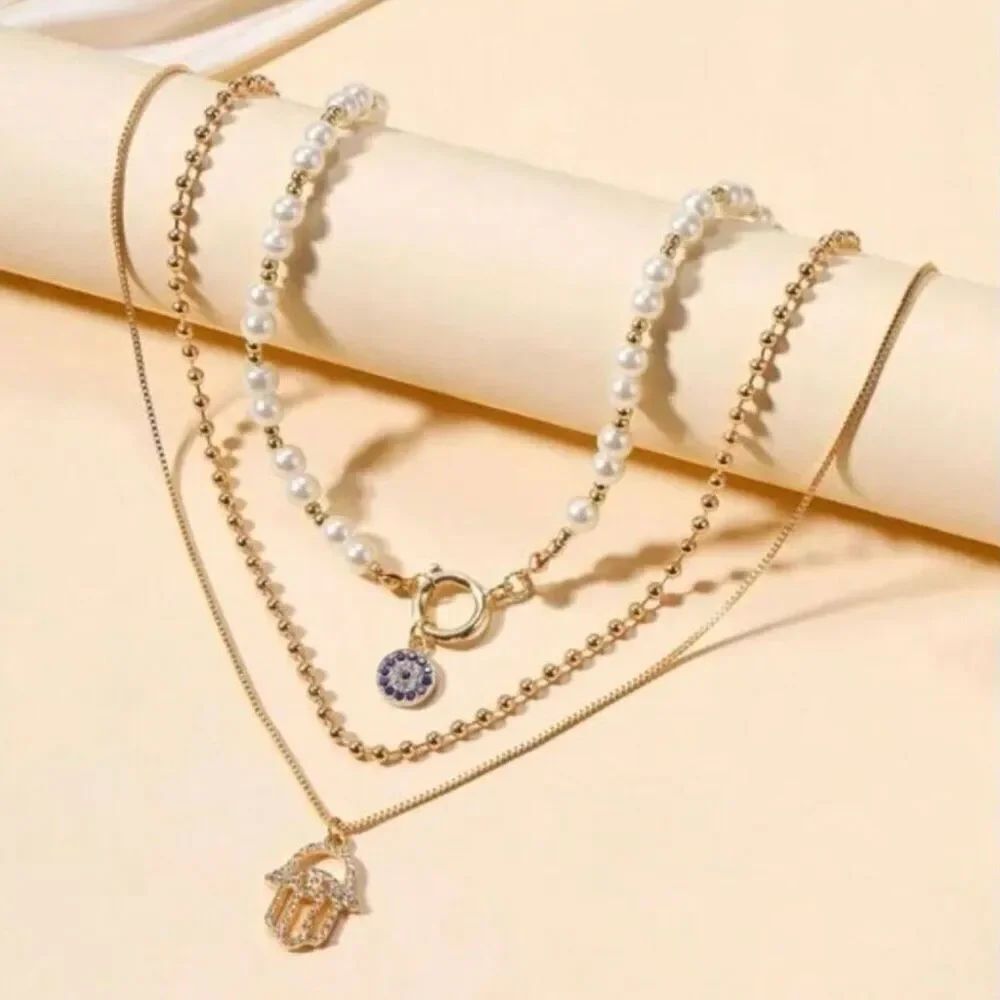 NWT Evil Eye & Hamsa Hand Faux Pearl Triple Strand Layered Necklace Gold-tone OS